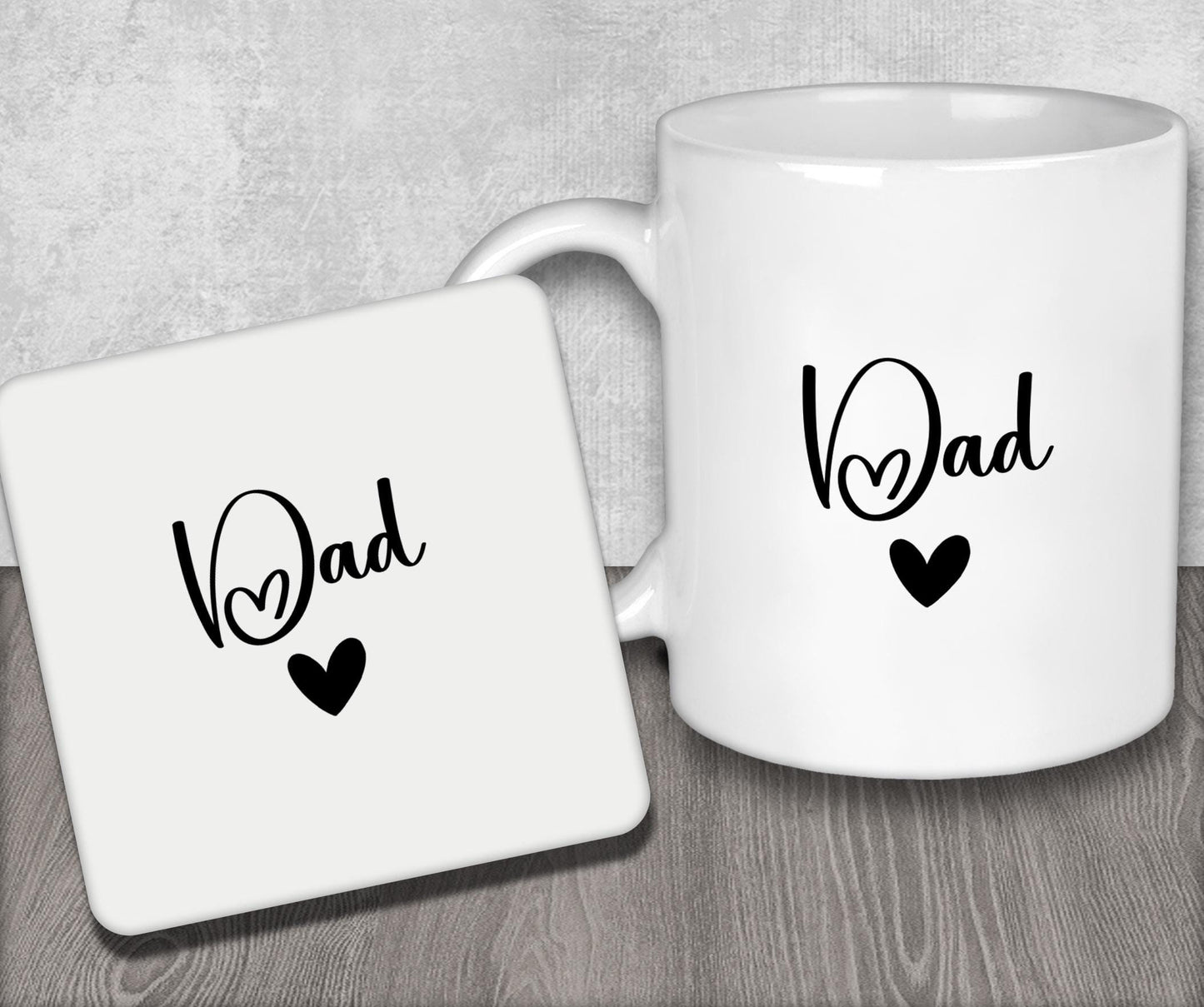 a white coffee mug sitting next to a coaster
