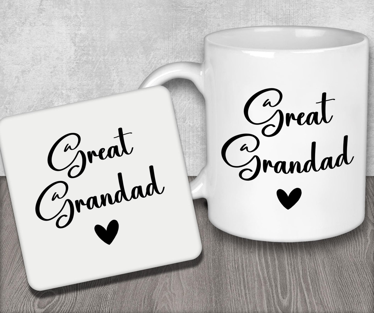 a couple of white coffee mugs sitting on top of a wooden table