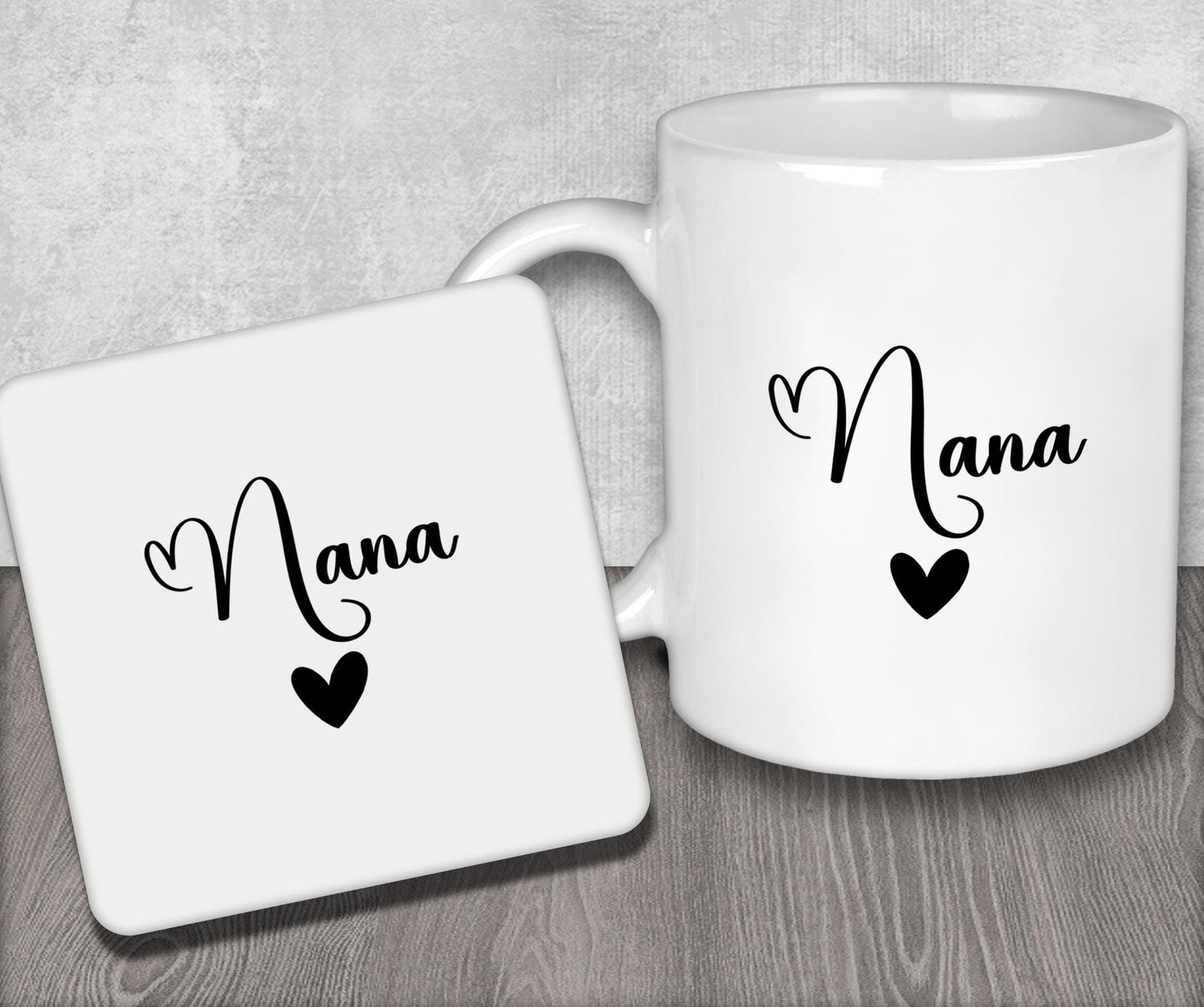 a white coffee mug sitting next to a coaster