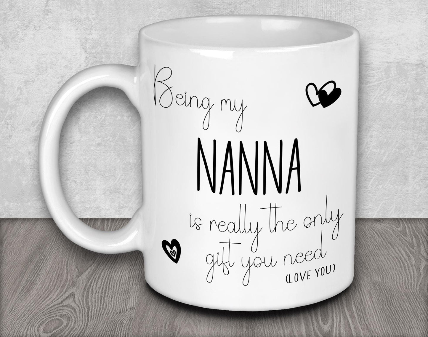 a white coffee mug with the words being my nanna is really the only gift