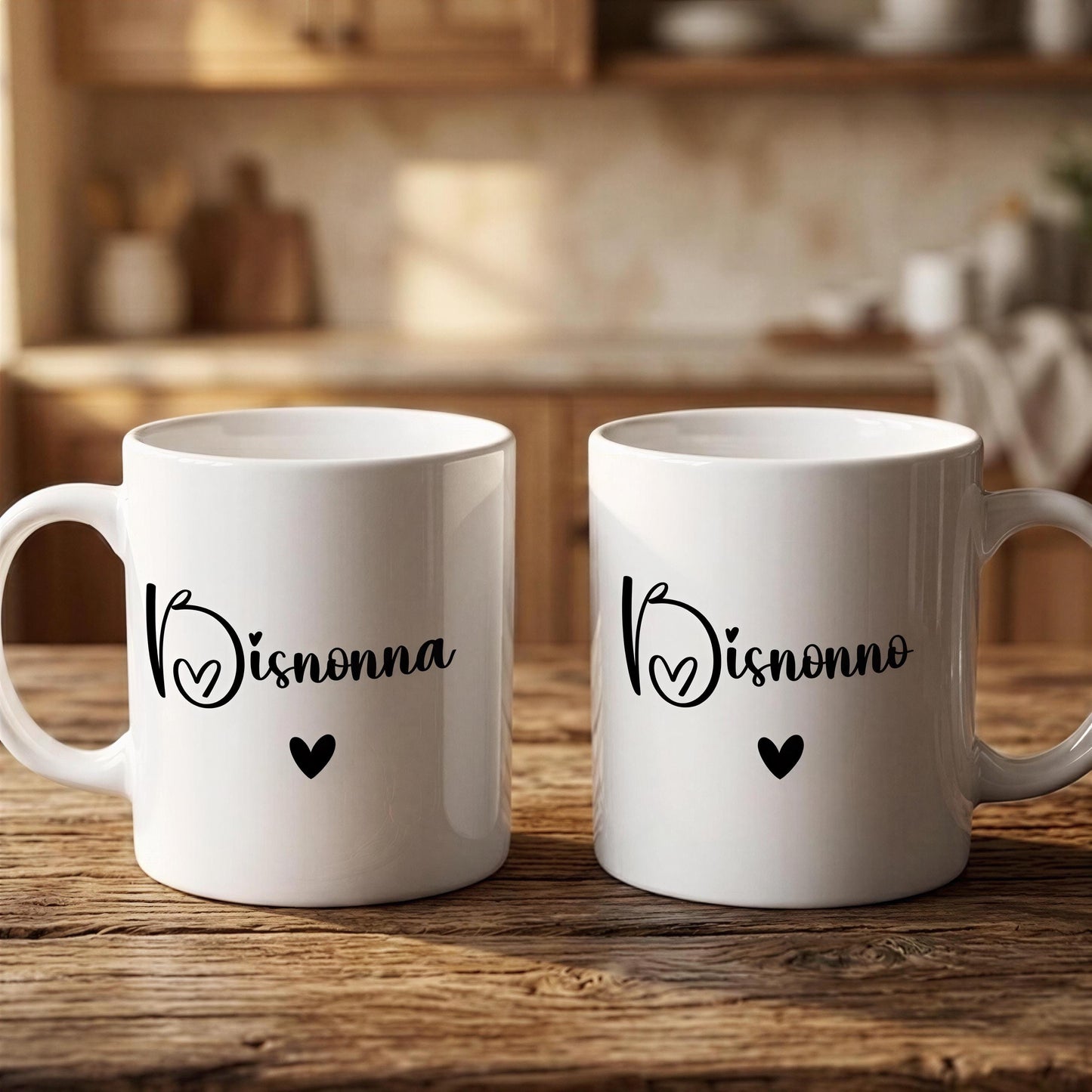 Two white mugs with the text "V isnonna" and a heart symbol printed on them, placed on a wooden surface.