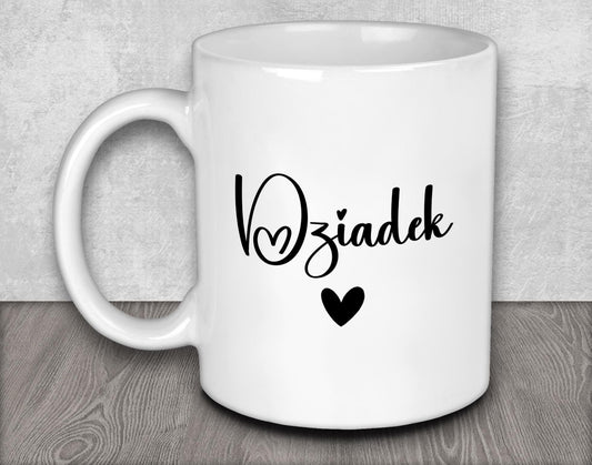 a white coffee mug with a black heart on it