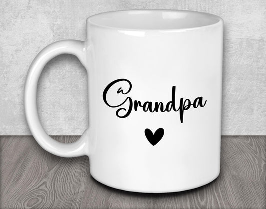a white coffee mug with the word grandpa written on it