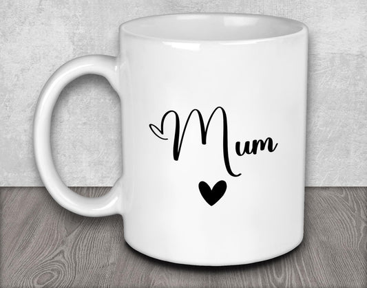 a white coffee mug with the word mum on it