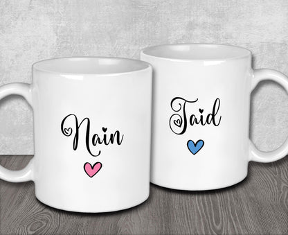 two coffee mugs with the words main and third on them