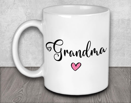 a white coffee mug with the word grandma on it