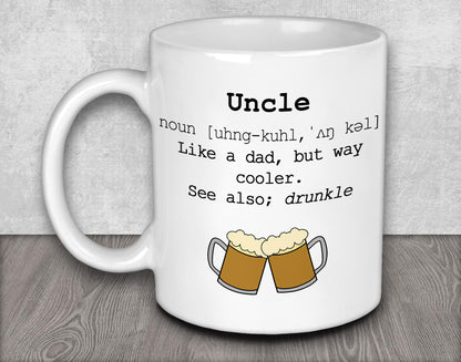 a white coffee mug with two mugs of beer on it