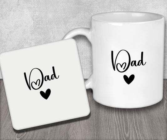 a white coffee mug sitting next to a coaster