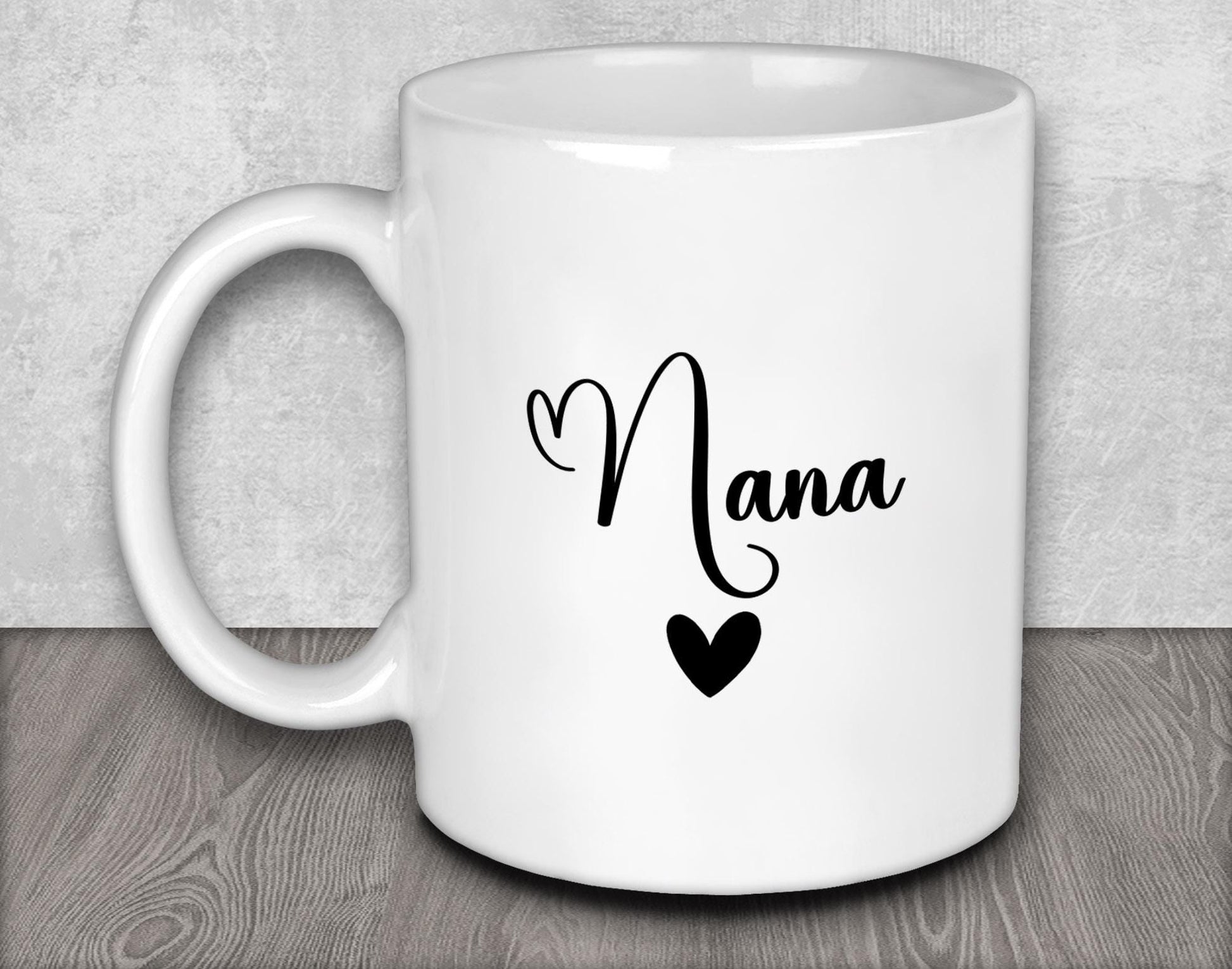 a white coffee mug with the word mama written on it