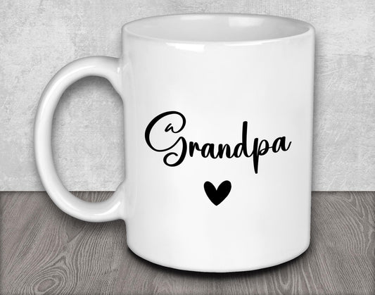a white coffee mug with the word grandpa written on it