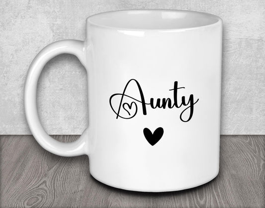 a white coffee mug with a black heart on it