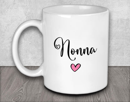 a white coffee mug with the word nonna on it
