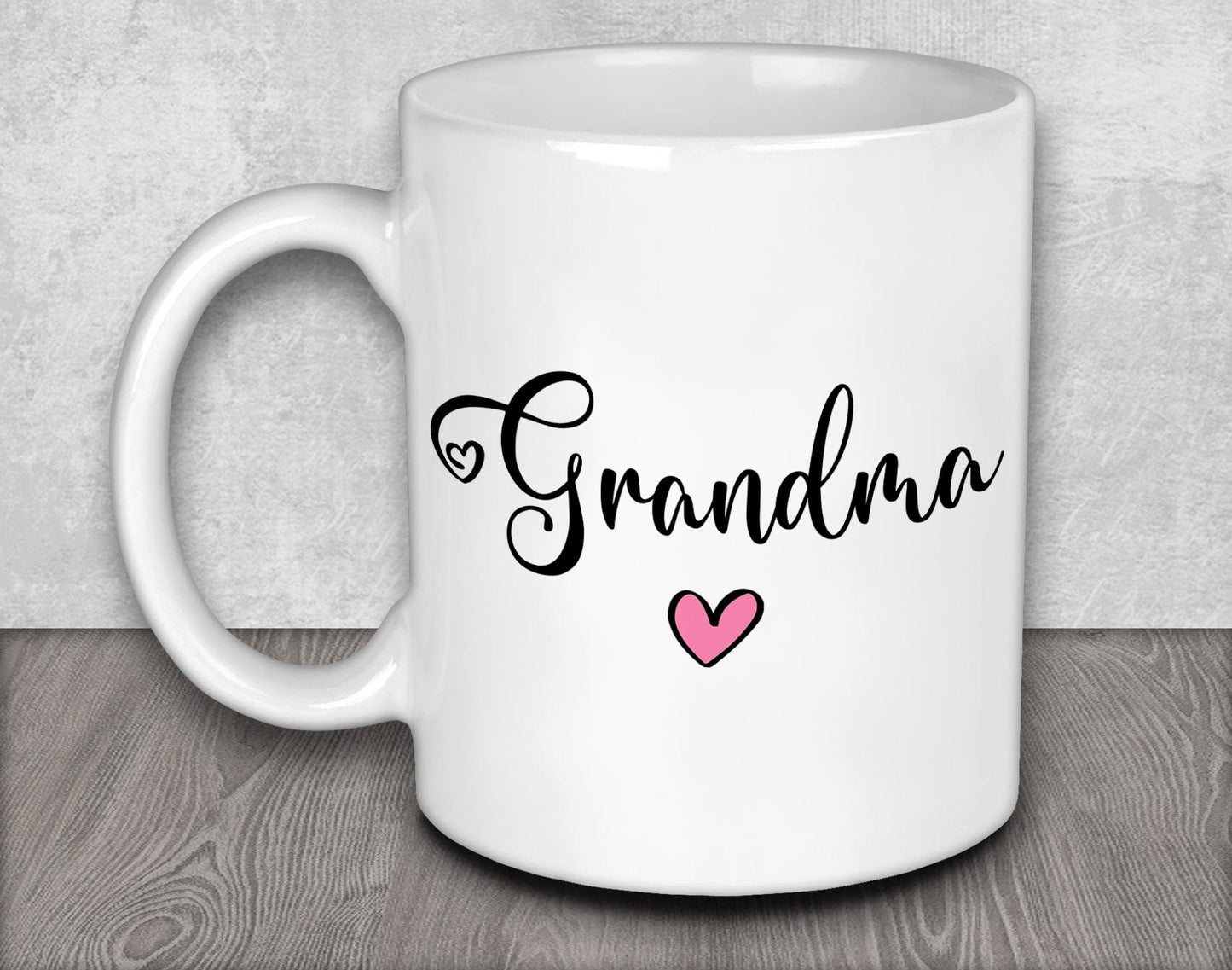 a white coffee mug with the word grandma on it