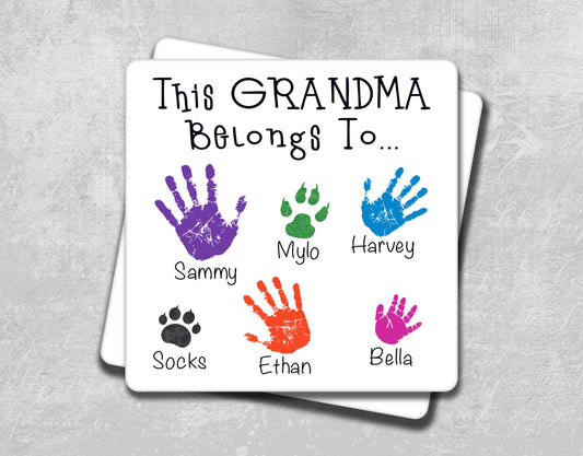 this grandma belongs to hand prints on a coaster