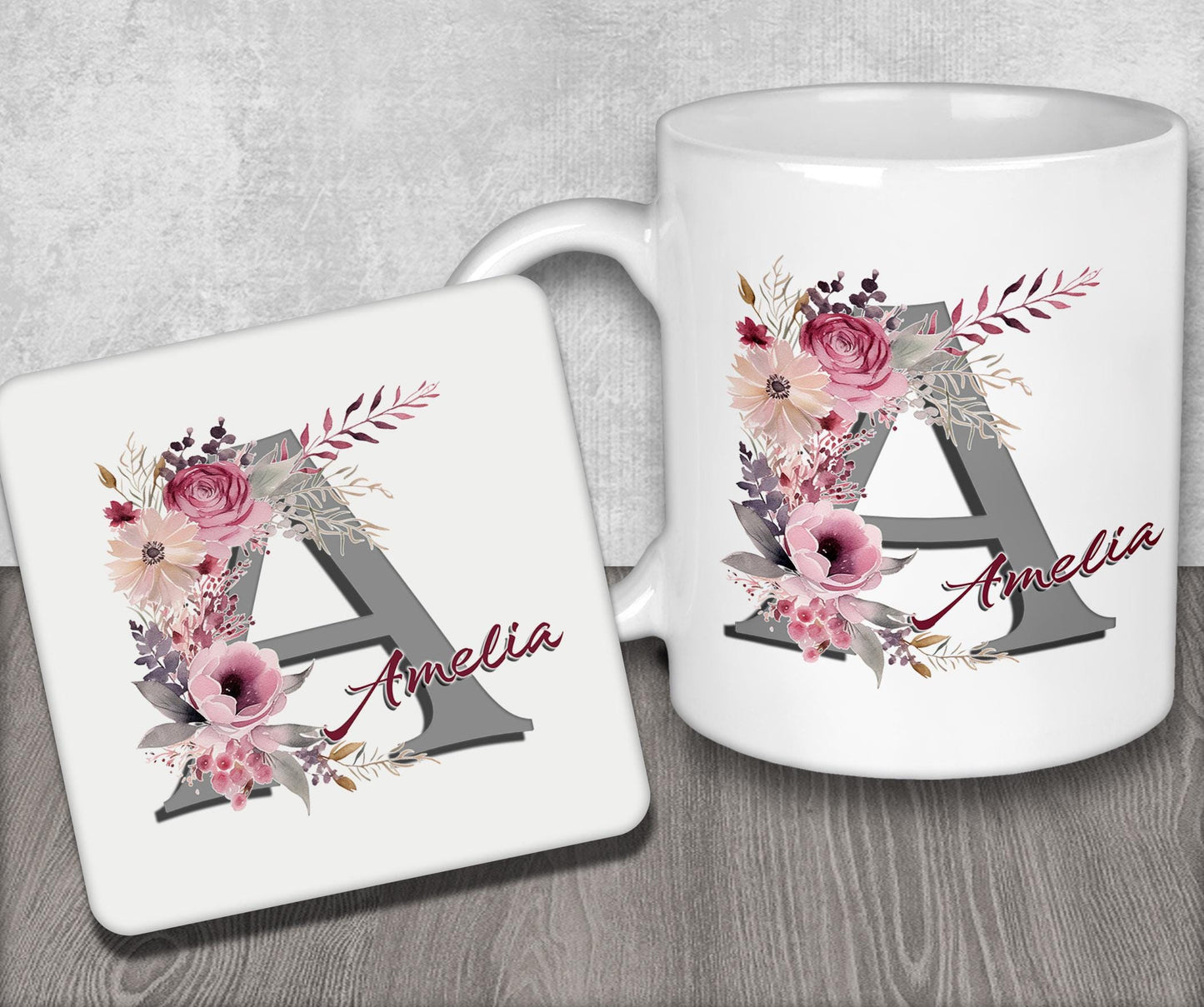 a white coffee mug with a floral monogrammed initial
