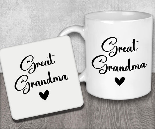 a couple of white coffee mugs sitting on top of a wooden table