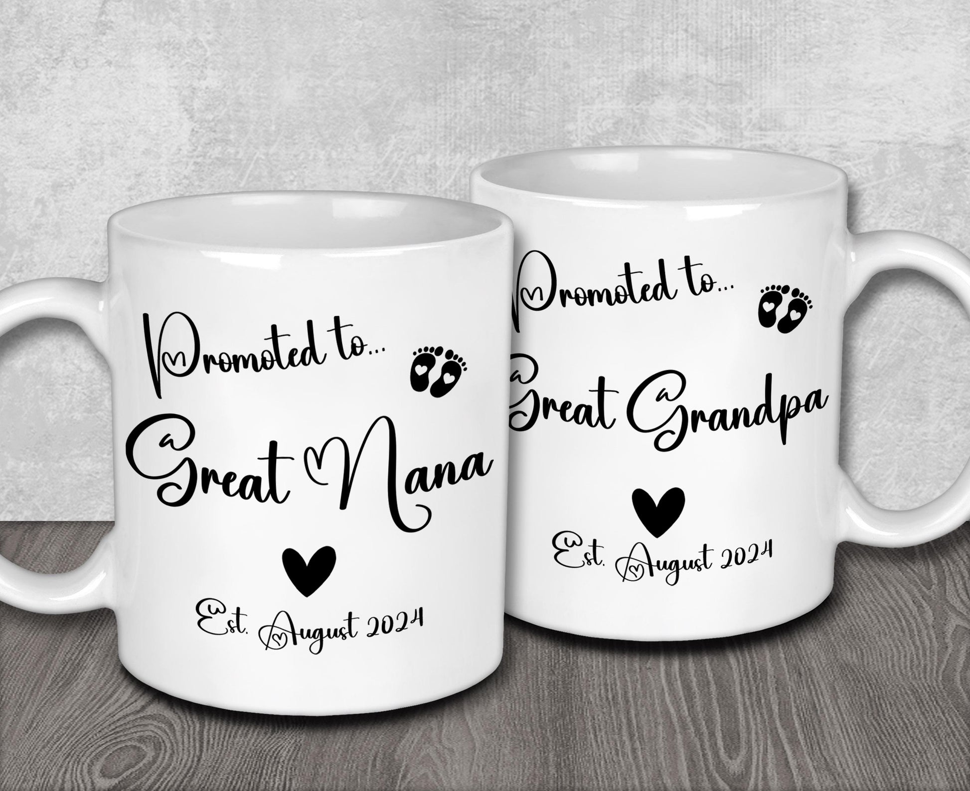 a couple of white coffee mugs sitting on top of a wooden table