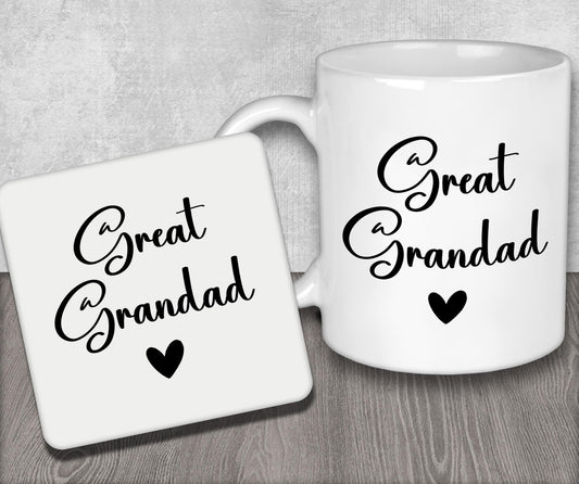 a couple of white coffee mugs sitting on top of a wooden table