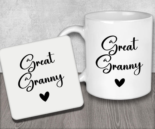 a couple of white coffee mugs sitting on top of a wooden table