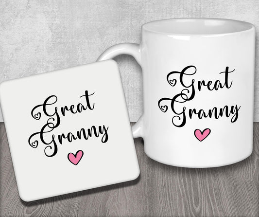 a couple of white coffee mugs sitting on top of a wooden table