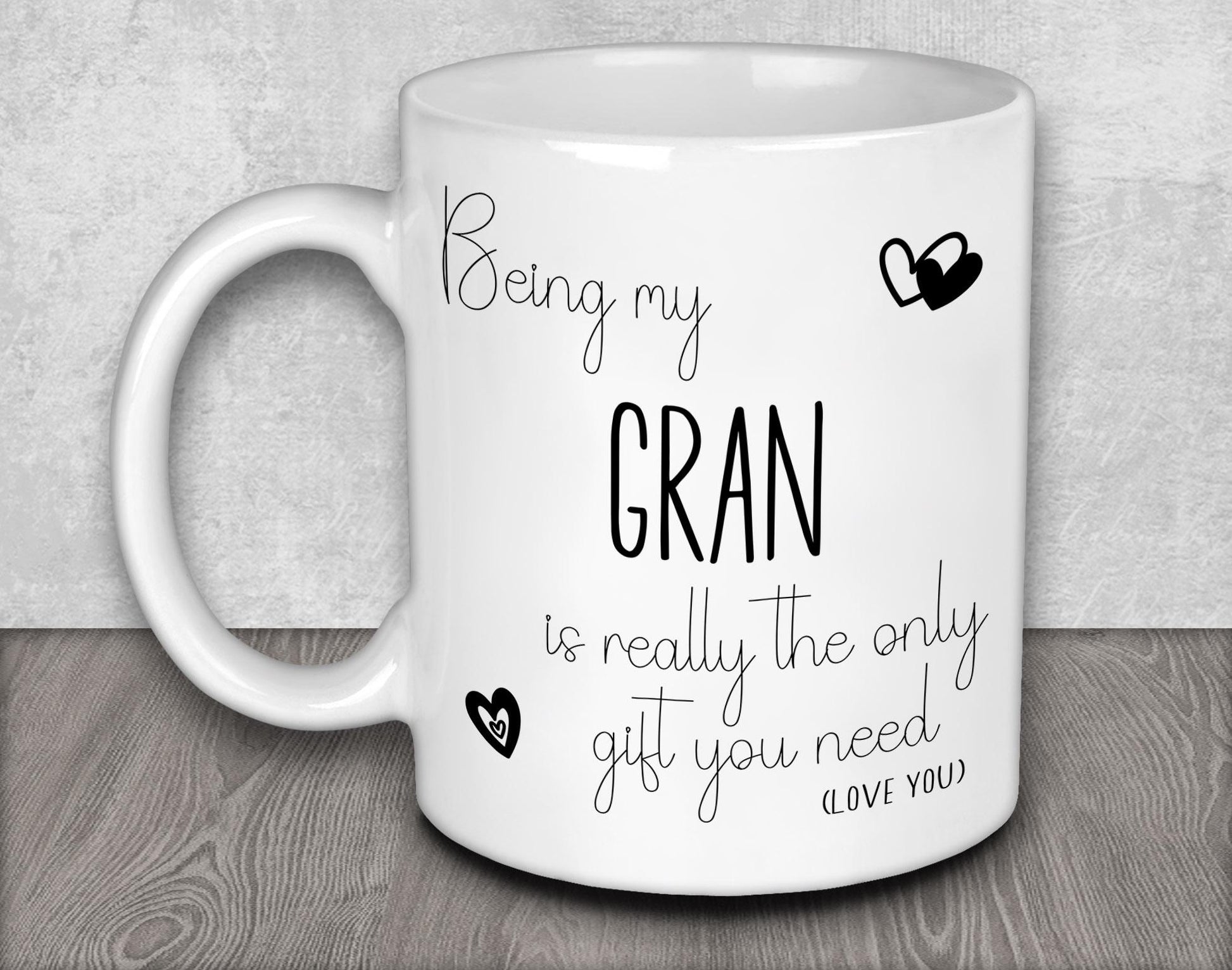 a white coffee mug with the words being my gran is really the only gift you