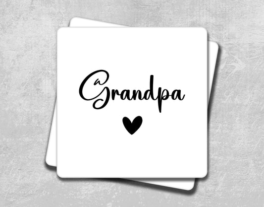 a coaster with the word grandpa written on it