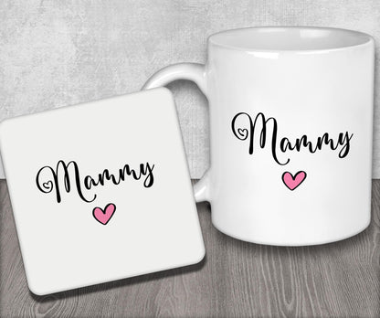 a white coffee mug with the word mommy on it