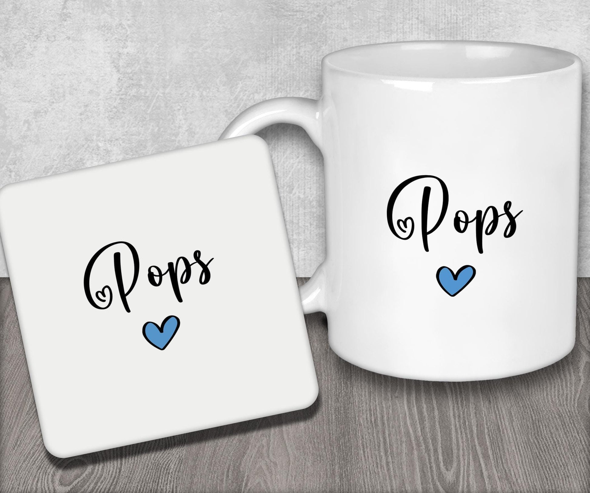 a white coffee mug with a blue heart on it