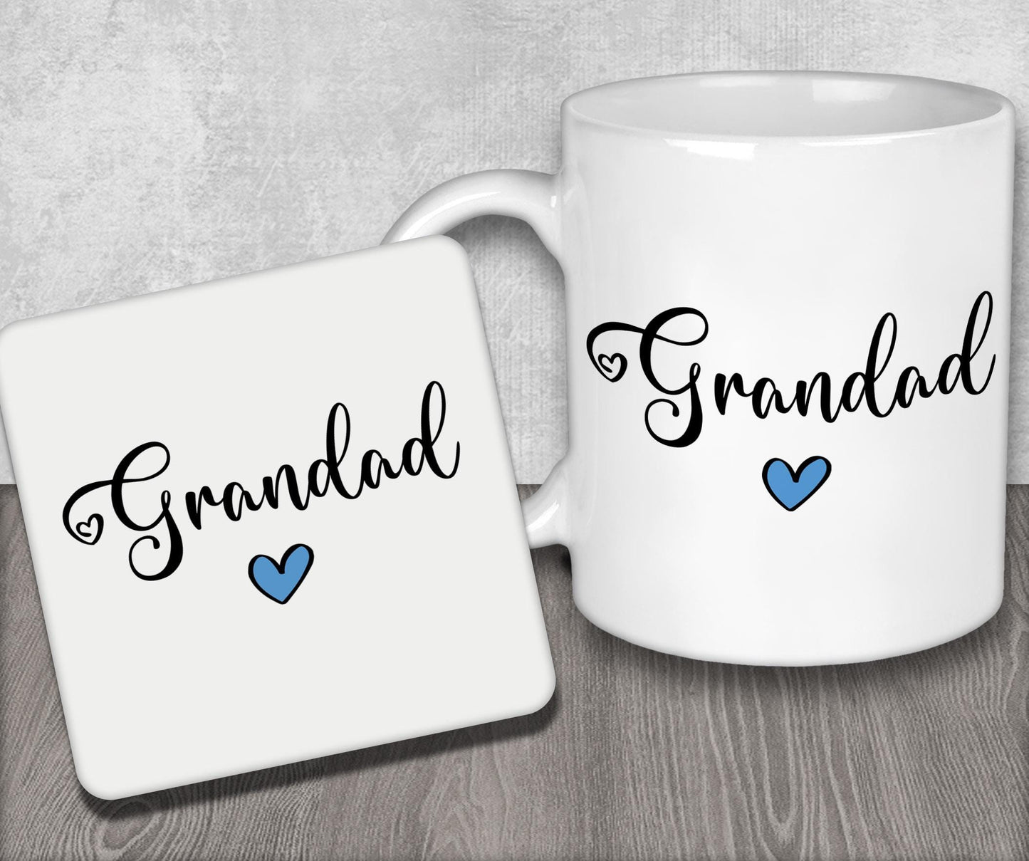 a white coffee mug sitting next to a coaster