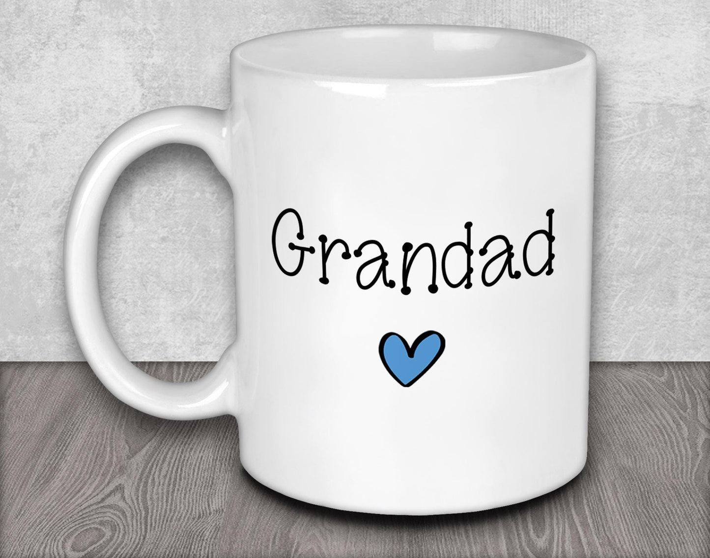 a white coffee mug with the words grandad printed on it