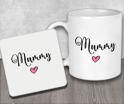 a white coffee mug with a pink heart on it