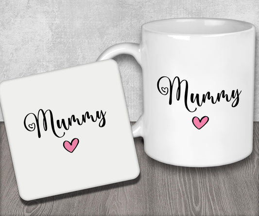 a white coffee mug with a pink heart on it