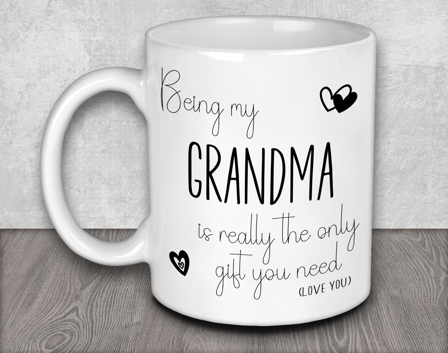 a white coffee mug with the words being my grandma is really the only gift you