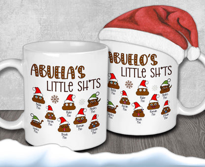 A pair of white mugs with a humorous design featuring a Santa hat and various toilet-themed cartoon characters.