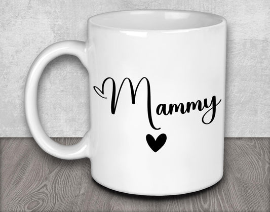 a white coffee mug with a black heart on it