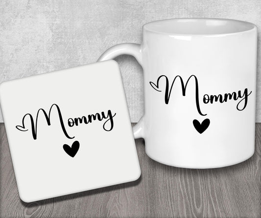 a white coffee mug with the word mommy printed on it