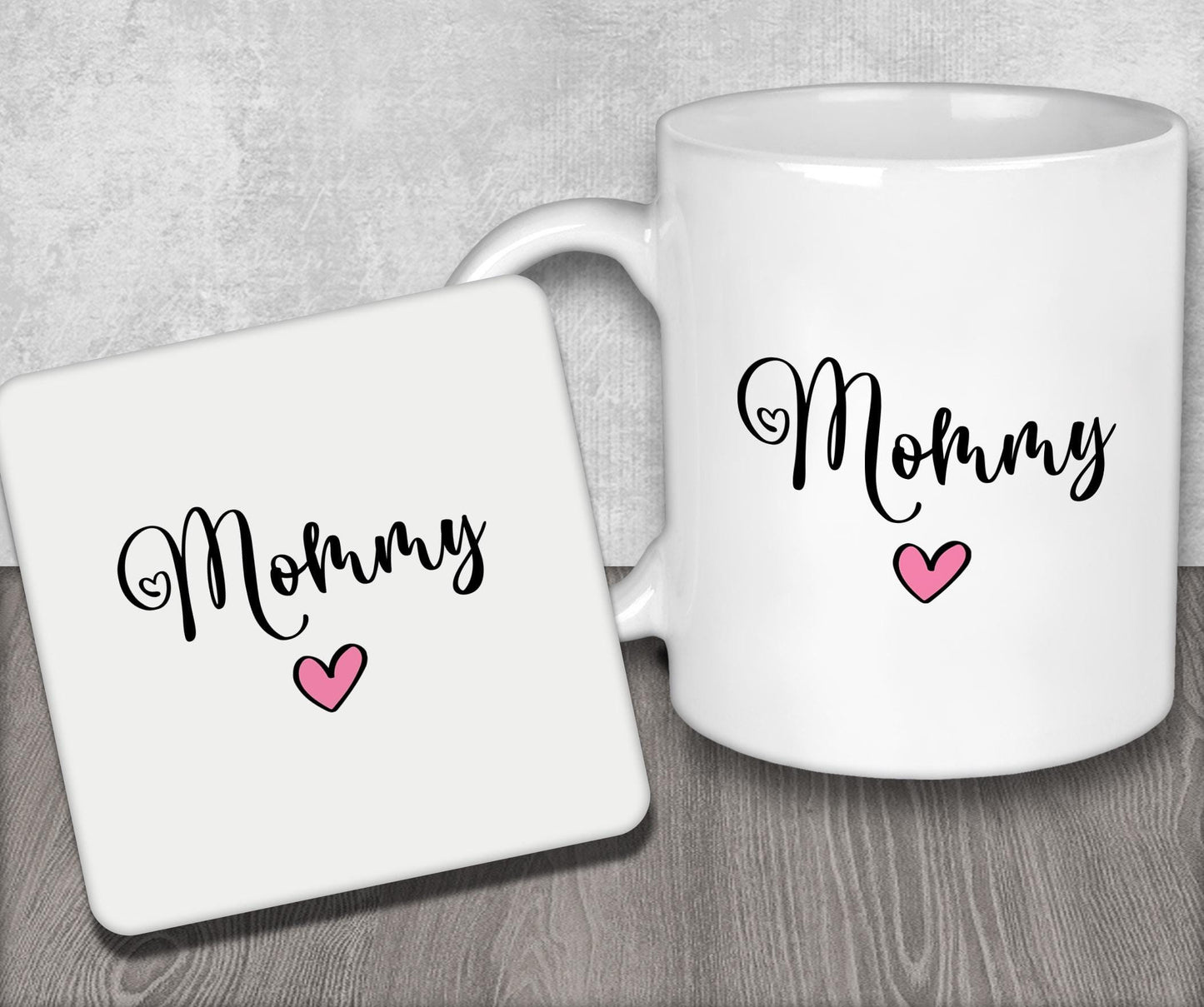 a white coffee mug with the word mommy on it