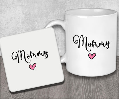a white coffee mug with the word mommy on it