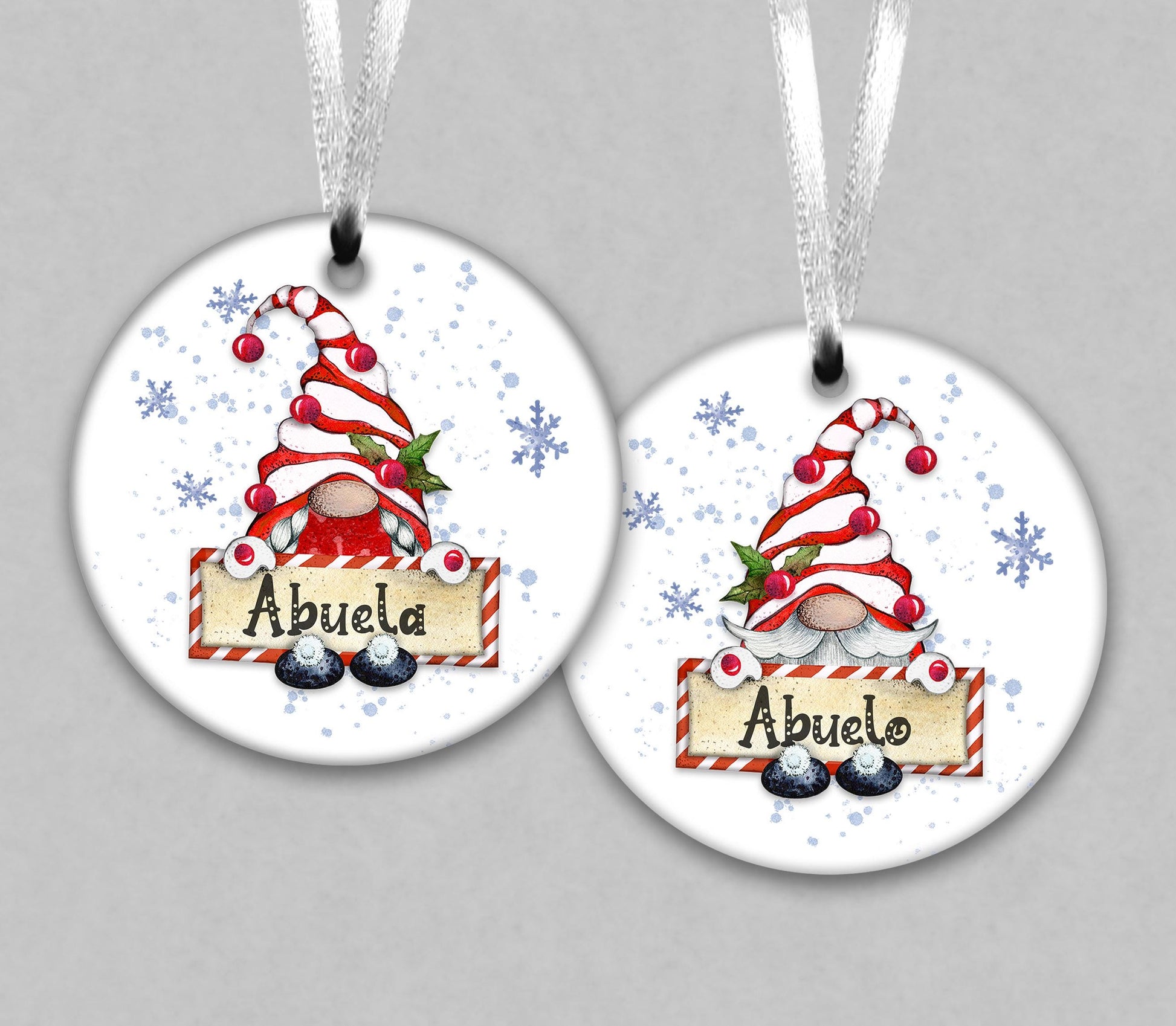 two round Christmas ornaments with a gnome design and the name &quot;Abuela&quot; written on them.