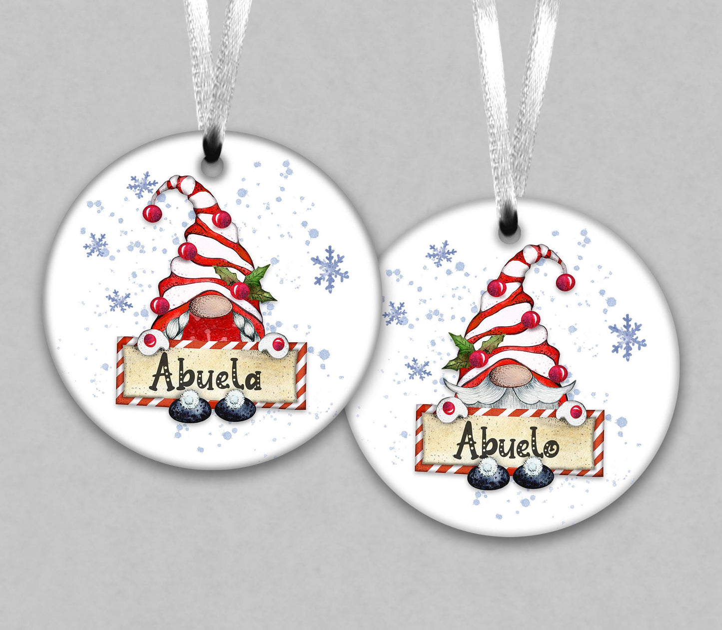 two round Christmas ornaments with a gnome design and the name &quot;Abuela&quot; written on them.