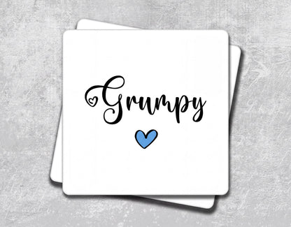 a white card with the word's name and a blue heart on it