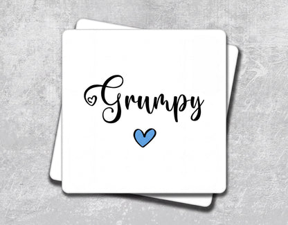 a white card with the word's name and a blue heart on it