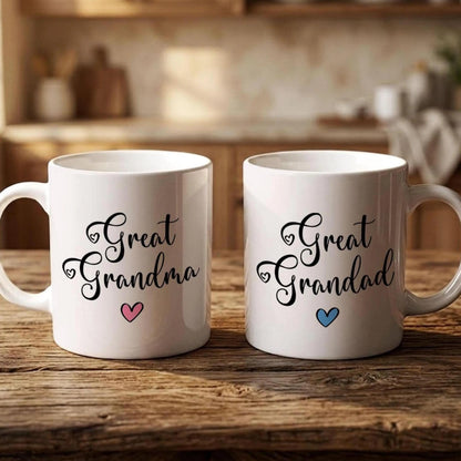 Two white mugs with black text and heart symbols, placed on a wooden surface.
