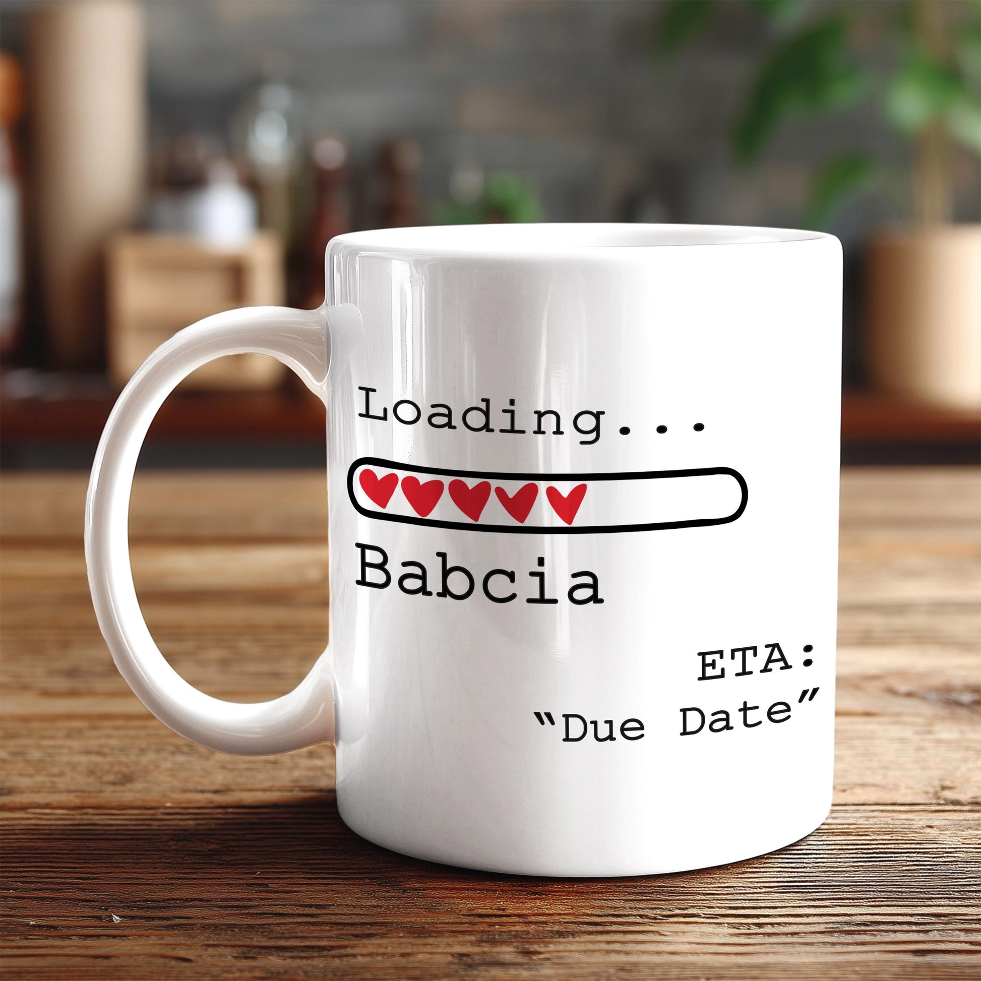 A white coffee mug with a humorous text and graphic design on it, placed on a wooden surface.