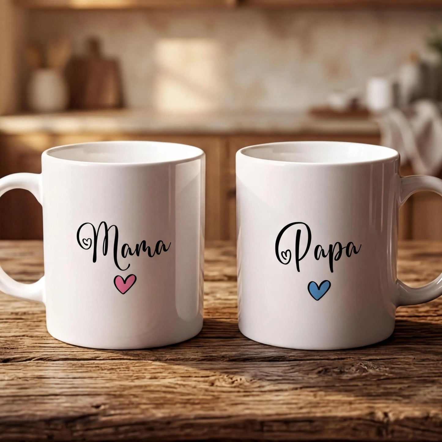 Two white mugs with the names "Mama" and "Papa" printed on them, along with a heart symbol, are placed on a wooden surface.