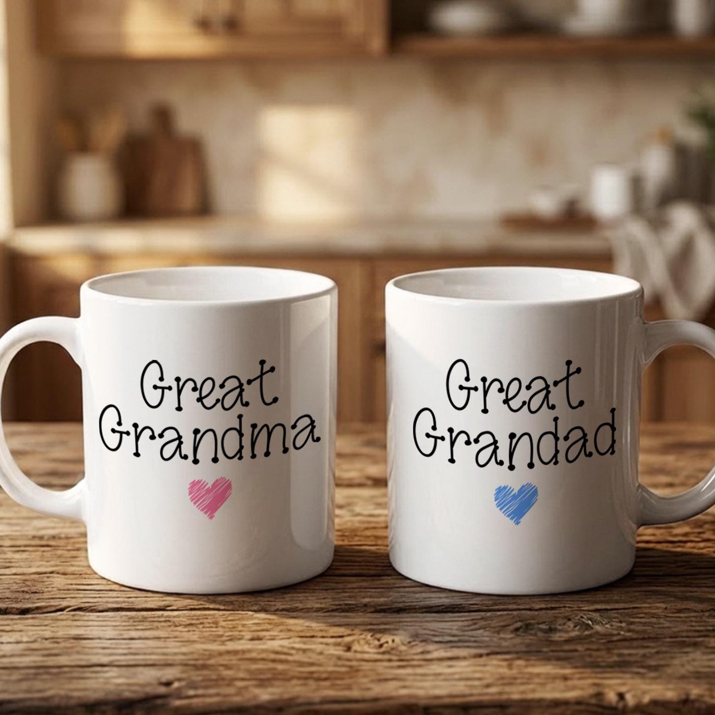 Two white mugs with the text "Great Grandma" and "Great Granddad" printed on them, along with a heart symbol, are placed on a wooden surface.