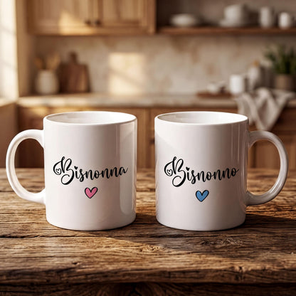 Two white mugs with the name "Bisnonna" and a heart symbol printed on them, placed on a wooden surface.