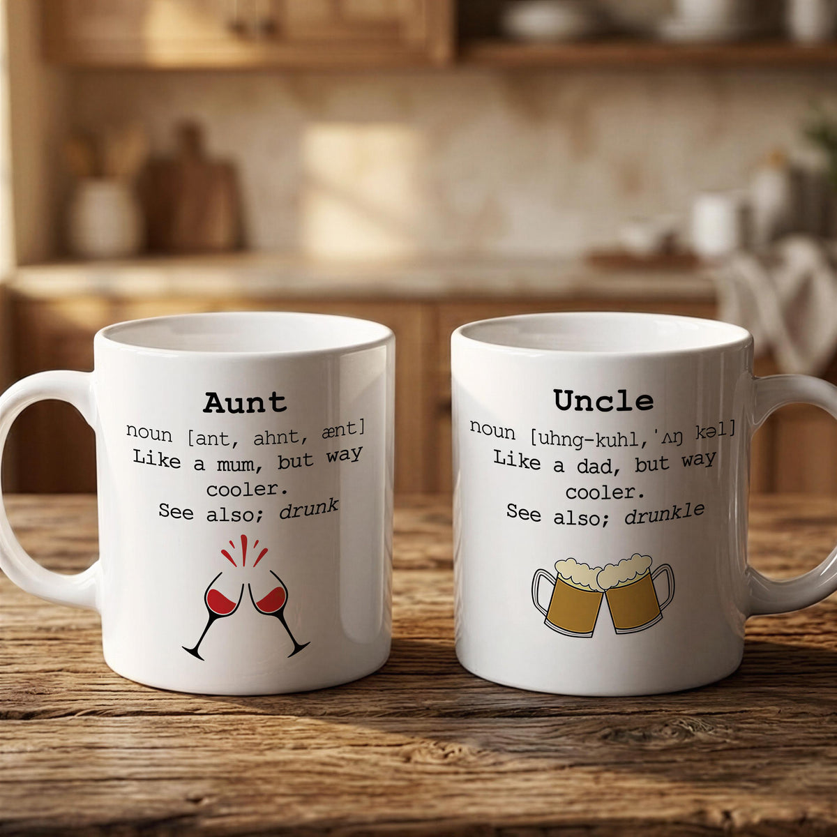 Two white mugs with humorous text and illustrations on them, placed on a wooden surface.
