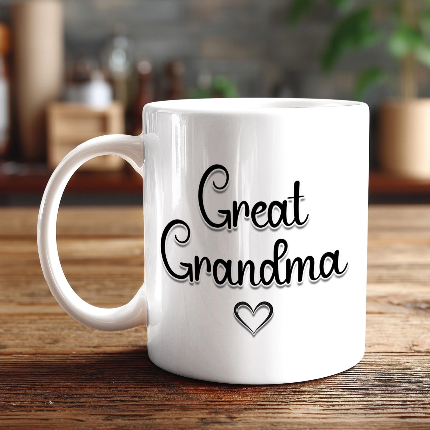 A white ceramic mug with the text "Great Grandma" printed on it, along with a heart symbol, sits on a wooden surface.