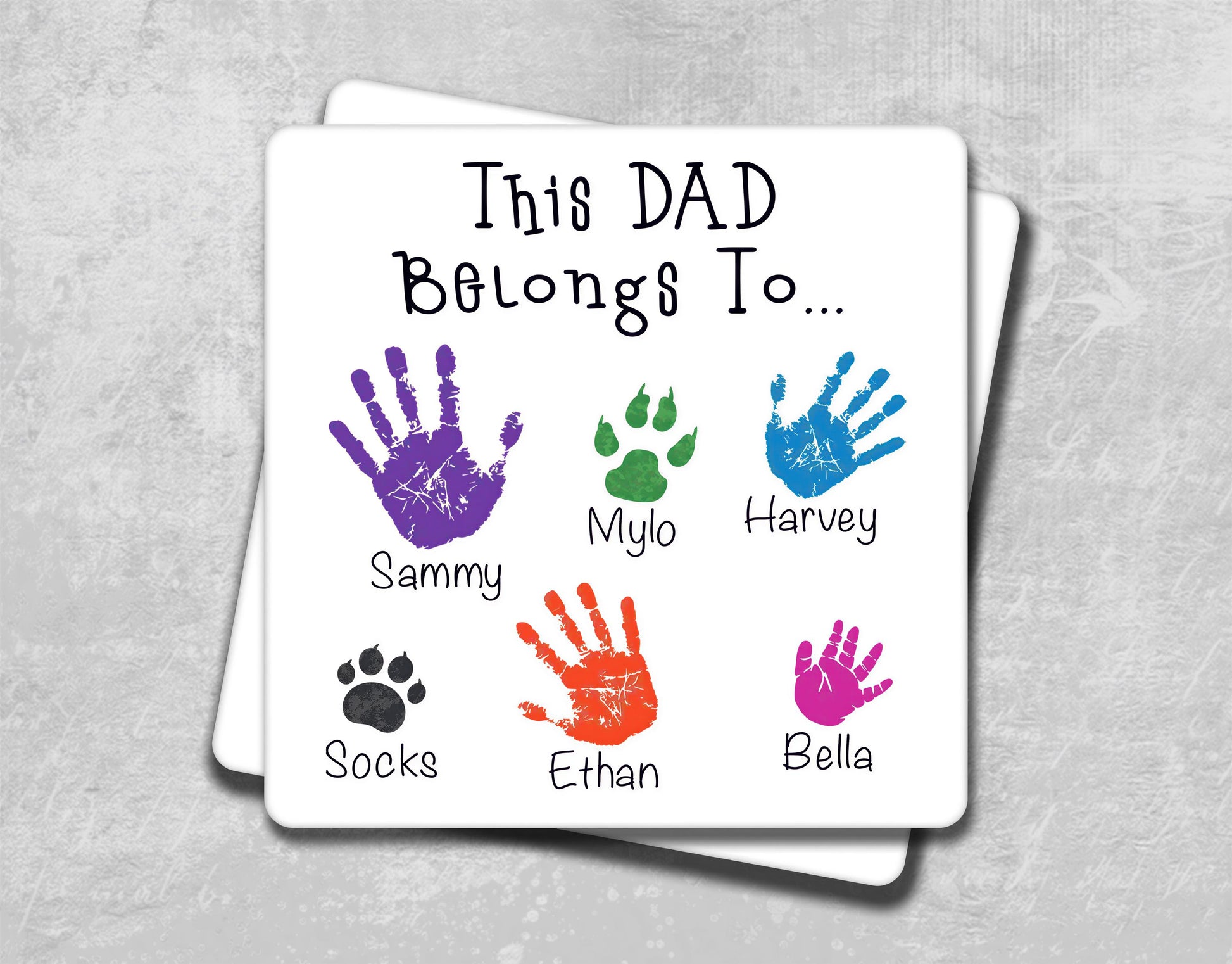 a coaster with a handprint of different colors